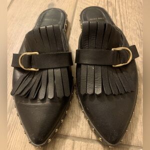 Black Anine Bing tasseled mule with gold stud detail. Size 6
